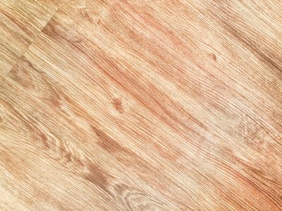 Close-up of a smooth wooden surface with natural patterns.